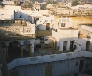 Note this 2nd floor flat in the desert of Rajasthan, India, has an outdoor courtyard livingroom and kitchen. Only the bath and bedrooms are indoors.