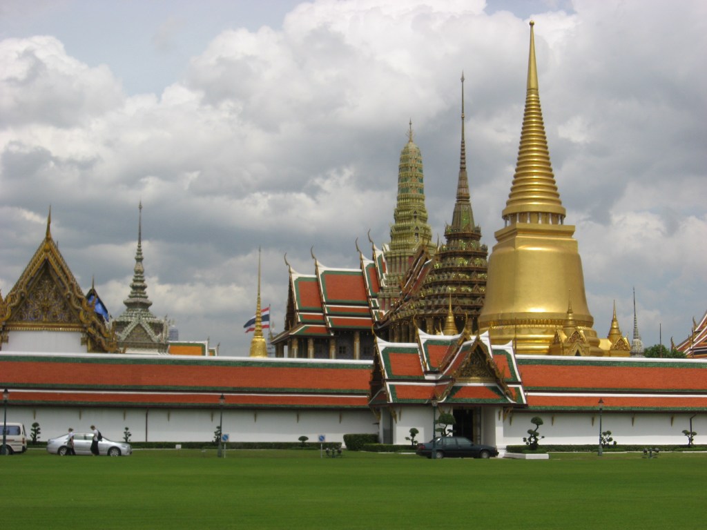 Wat Phra Kaeo temple complex - gold tower contains Buddha's breastbone, 2nd tower is a Buddhist library, 3rd tower contains a life-size emerald Buddha