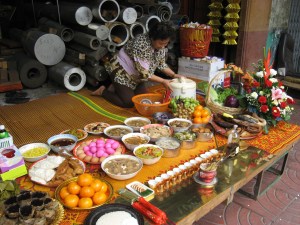 This woman was happy for me to take a picture of her offering to the monks on this full moon Holy day