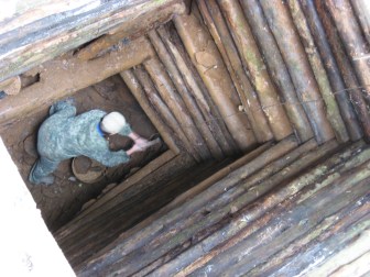 Nicolay climbed down into this mine using the logs since someone had stolen his ladder. Very cold down there.