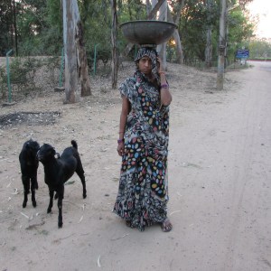 My brother John would ask this girl what time it is, to see if she would lower her head and accidentally spill whatever that is she is carrying in the bowl