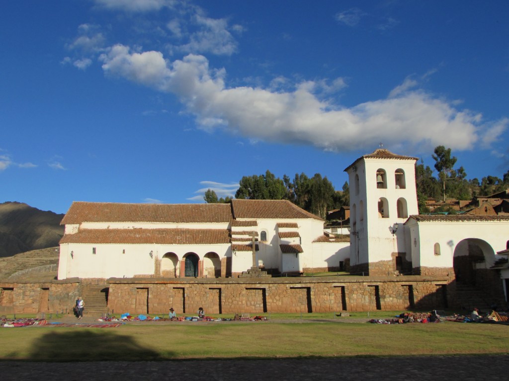 Chinchero, the height of religious places for Incas. In the niches in the wall around what was an Inca temple but was replaced with a Spanish church, were mummies of all the Incas and high ranking people of the empire. During celebrations the mummies, dressed in gold, would be paraded by the people followed by chicha (corn beer) drinking.