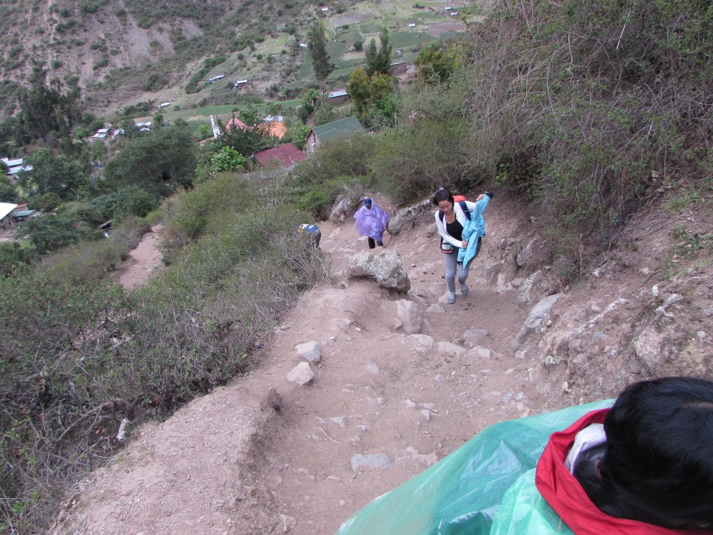 The dirt trail slowly becomes stone steps