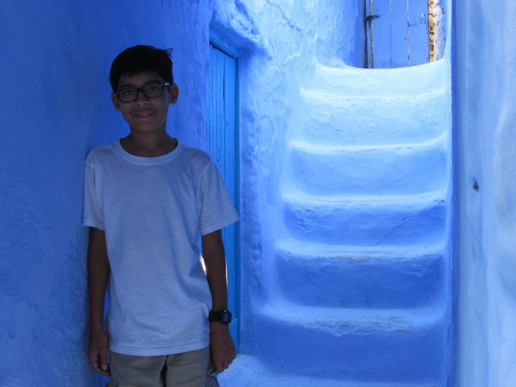 My grandson Andrew in doorway at Blue Pearl City (Chefchaouen) in north of Morocco 